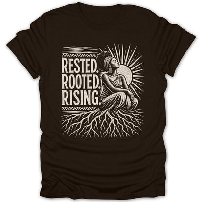Brown t-shirt with illustration of a woman sitting on roots with text "RESTED. ROOTED. RISING."