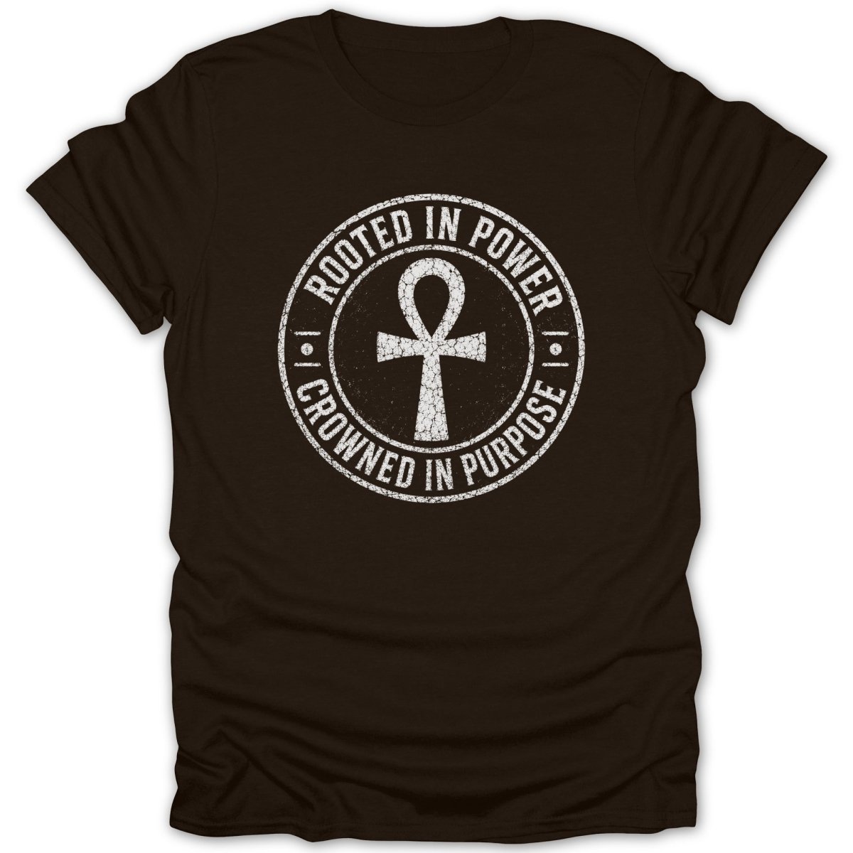 Brown t-shirt with white distressed print of an ankh and text "Rooted in Power Crowned in Purpose".