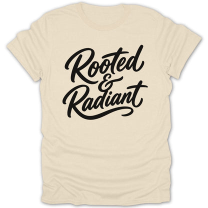 Cream t-shirt with "Rooted & Radiant" text in black script font.