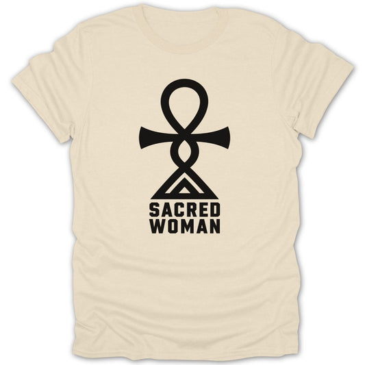 Cream t-shirt with black Ankh symbol above "SACRED WOMAN" text.