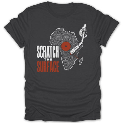 Dark t-shirt with a graphic of Africa and text "SCRATCH THE SURFACE".