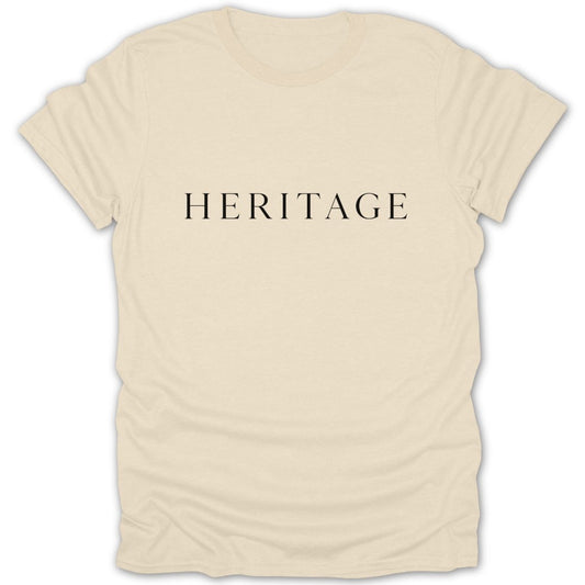 Cream t-shirt with "HERITAGE" text in black serif font.