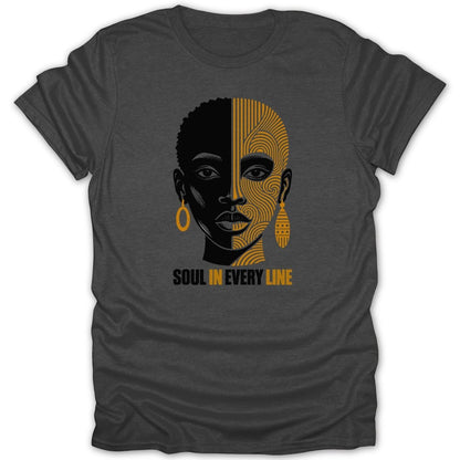 Graphic t-shirt with split face art and text "SOUL IN EVERY LINE".