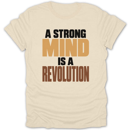 Cream t-shirt with text "A STRONG MIND IS A REVOLUTION" printed in bold letters.