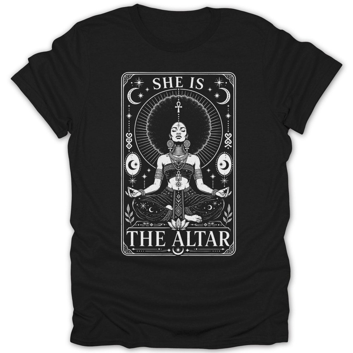 Black t-shirt with a white graphic of a meditating woman with an ankh and text "SHE IS THE ALTAR".