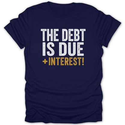 Navy t-shirt with white and gold text reading "THE DEBT IS DUE + INTEREST!".
