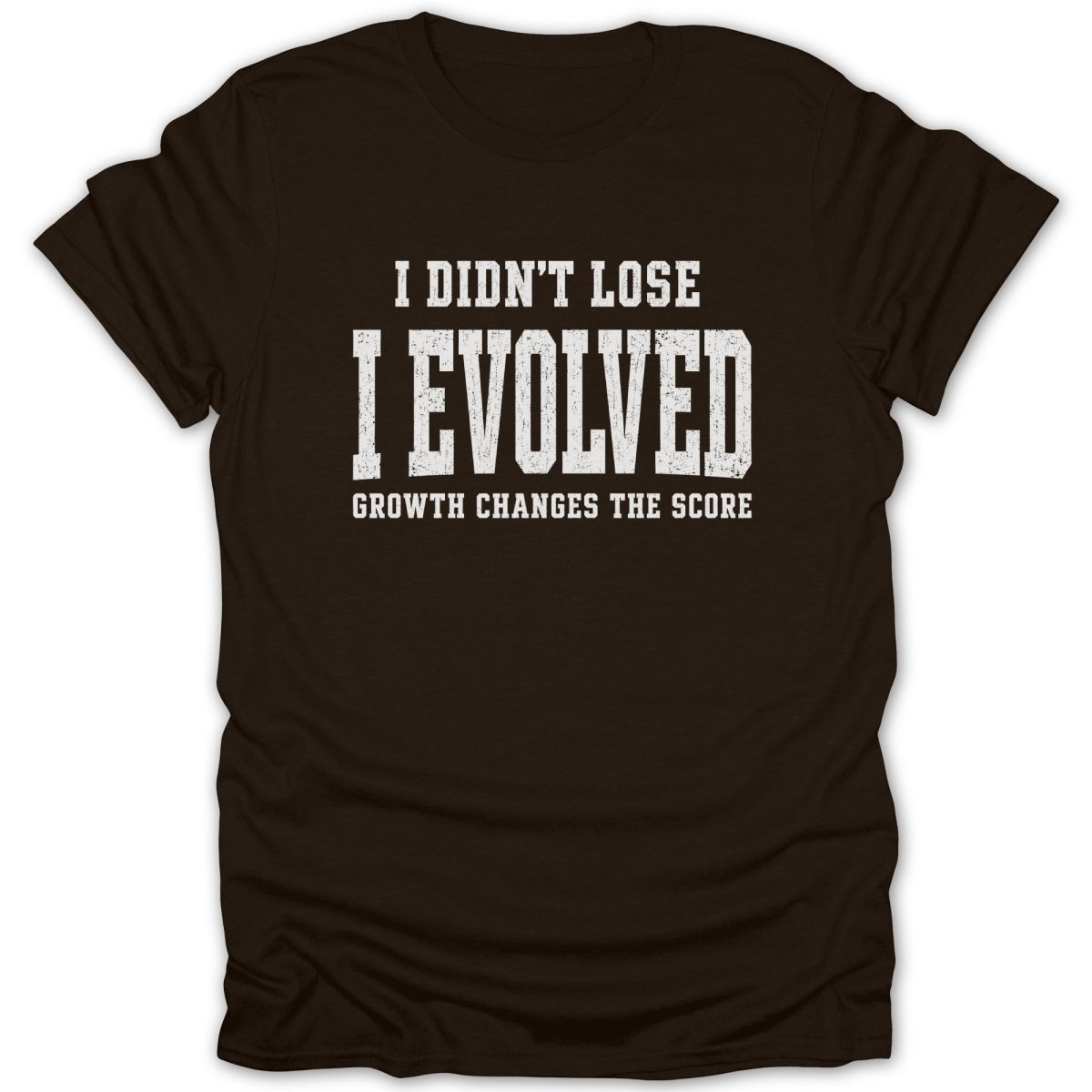 Brown t-shirt with text "I DIDN'T LOSE I EVOLVED GROWTH CHANGES THE SCORE"