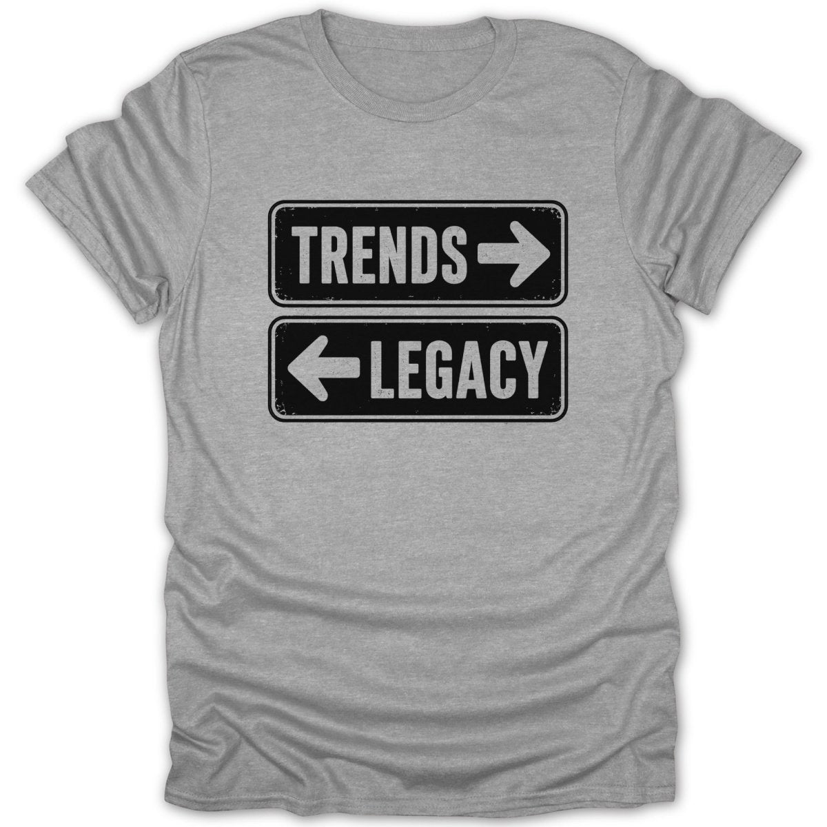 Grey t-shirt with black signs showing "TRENDS" pointing right and "LEGACY" pointing left.