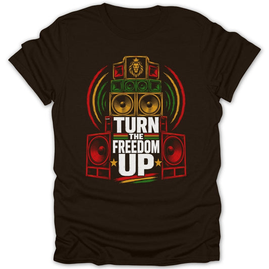 Brown t-shirt with stacked speakers, lion graphic, and text "TURN THE FREEDOM UP".