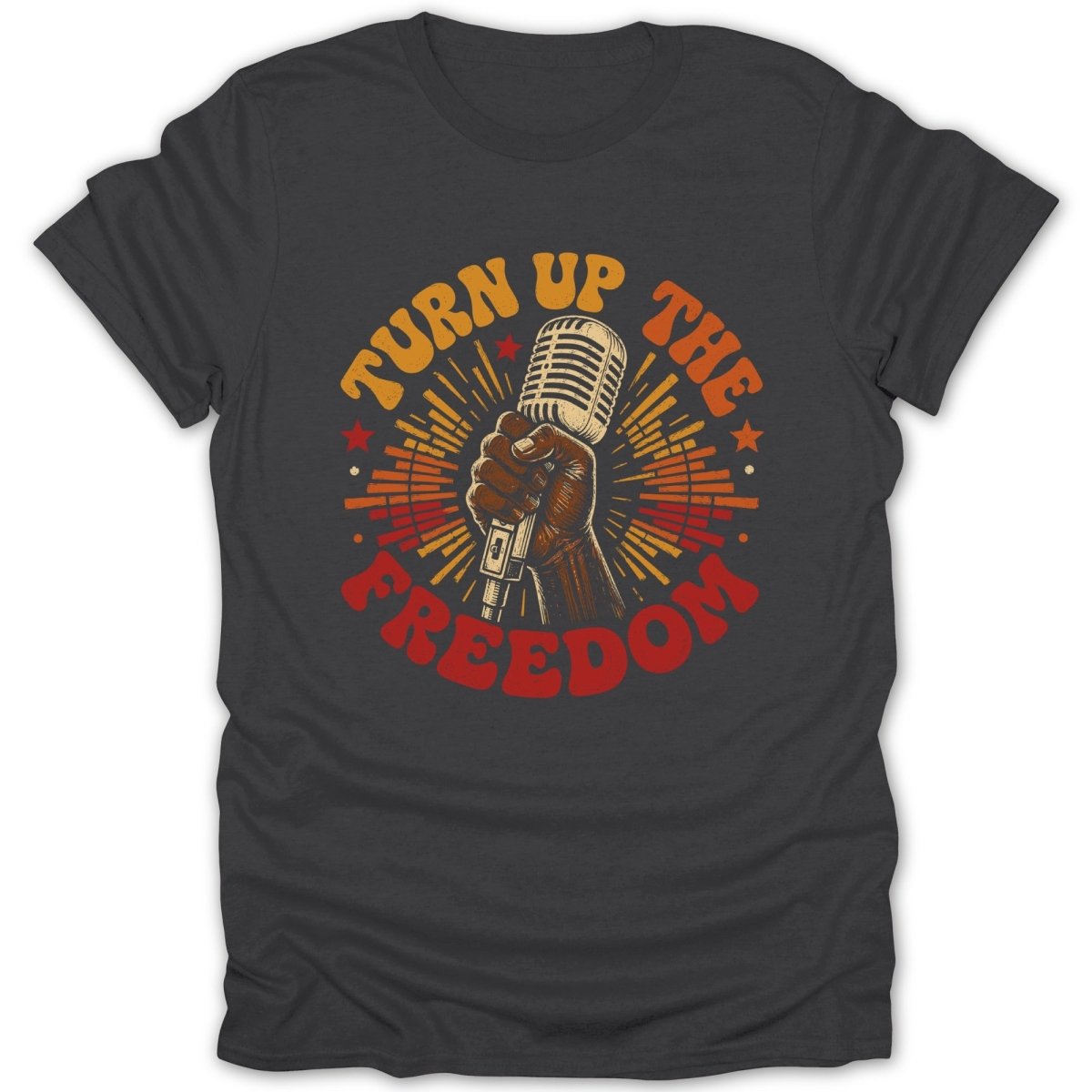 Dark gray t-shirt with retro graphic of hand holding microphone and text "Turn Up The Freedom".