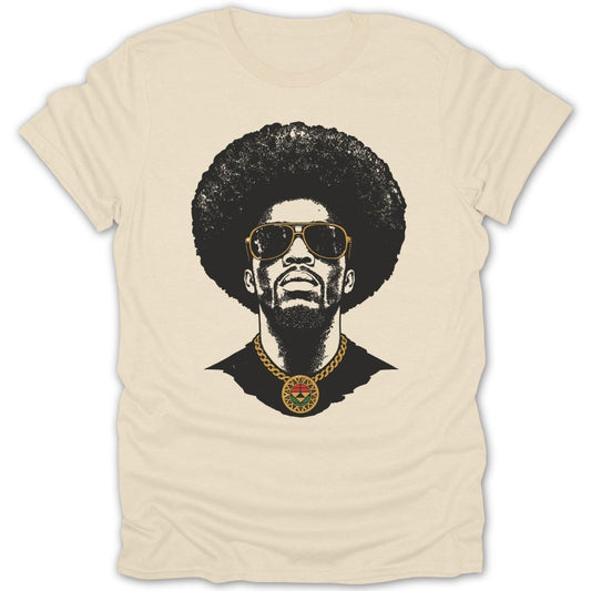 Black graphic print of a man with an afro, sunglasses, and a medallion on a cream t-shirt.
