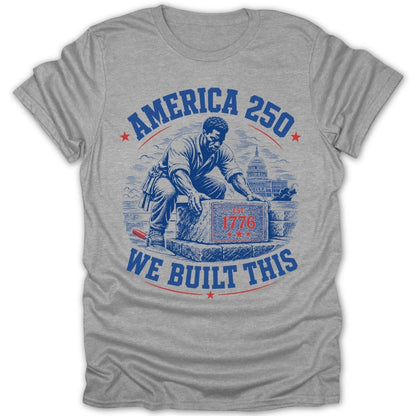 "America 250" and "We Built This" text surrounds man placing "Est 1776" stone.