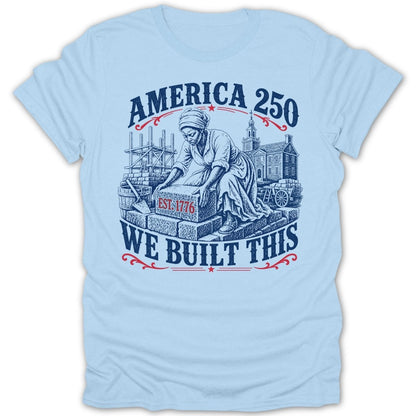 "America 250 We Built This" text with illustration of woman building, "Est. 1776" brick.