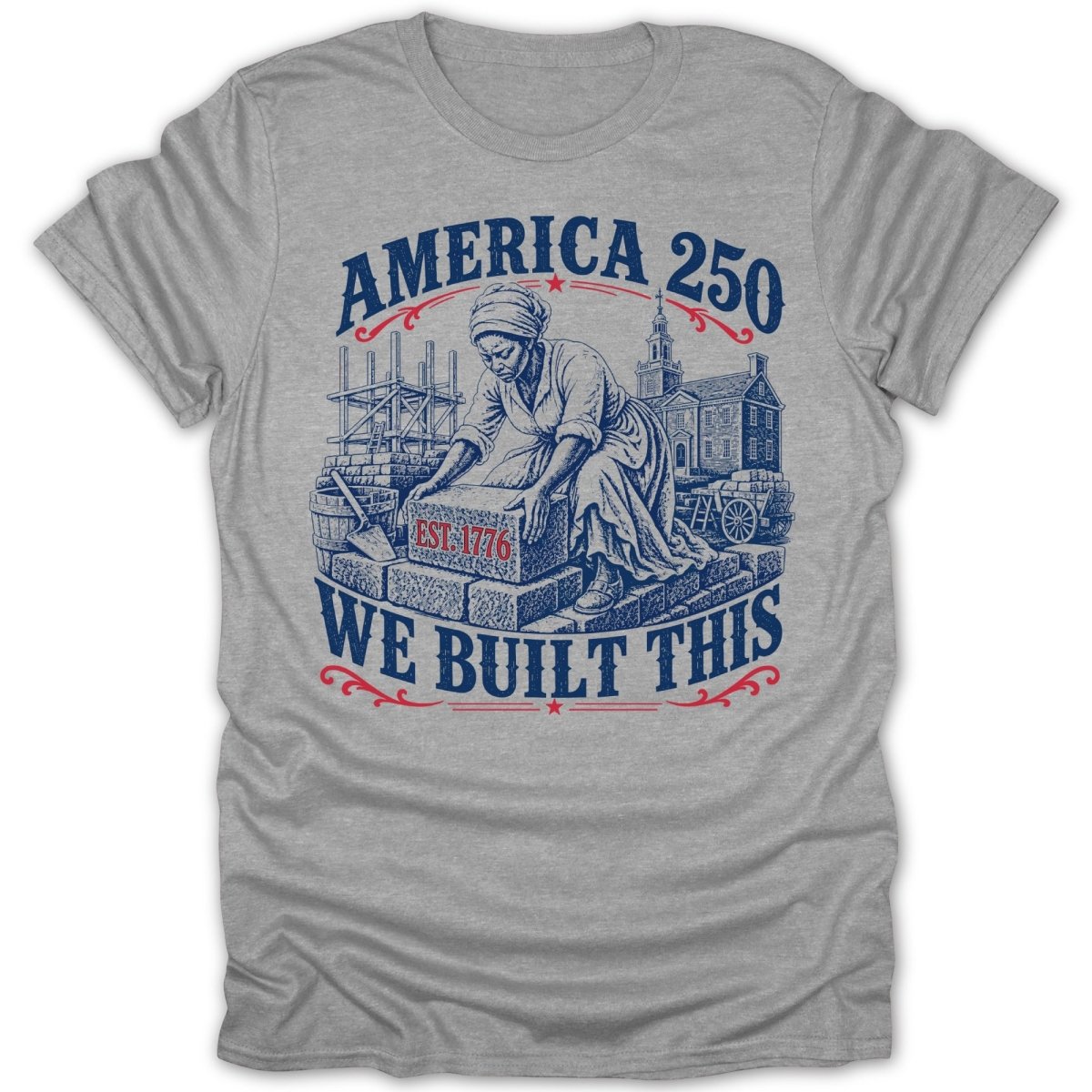 America 250 EST. 1776 We Built This graphic on a gray t-shirt.