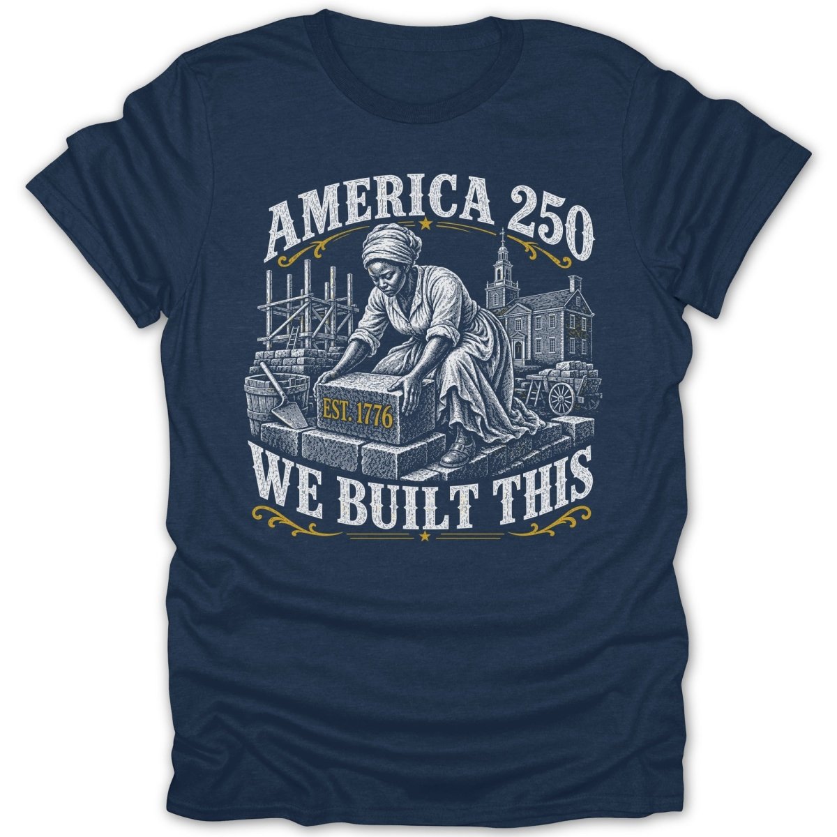 America 250: We Built This, EST. 1776 design on a navy t-shirt.