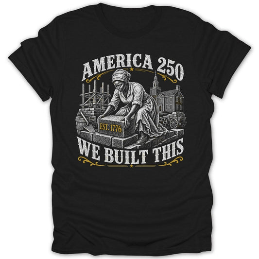 Black t-shirt featuring "AMERICA 250 WE BUILT THIS" and a depiction of a woman building.