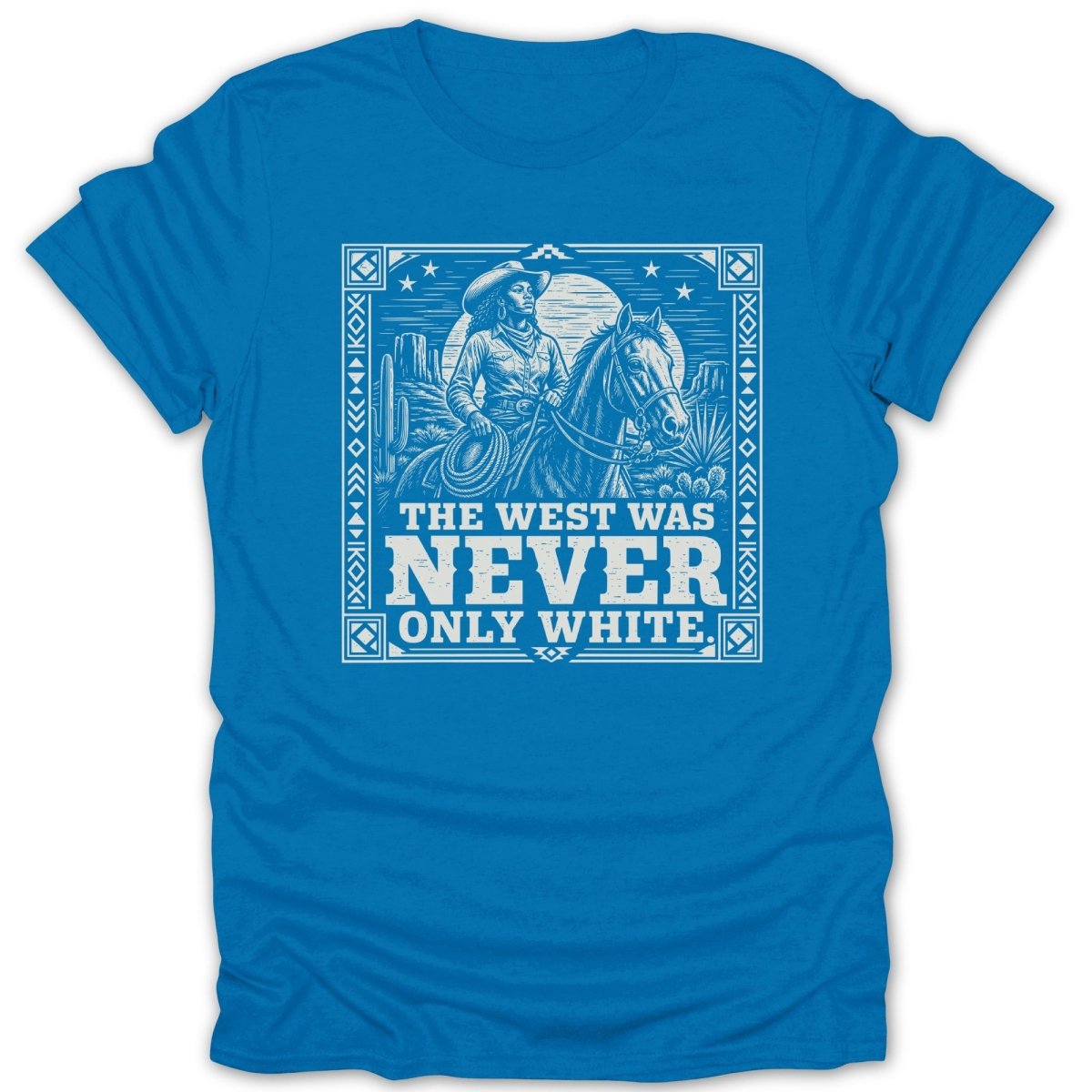 Graphic on blue t-shirt with cowboy and horse in desert scene, reads "The West Was Never Only White".