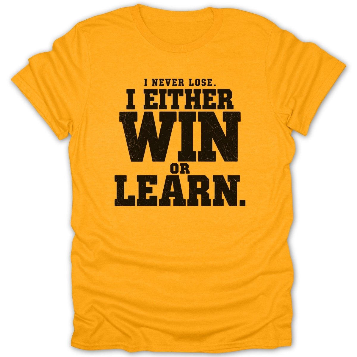 Yellow t-shirt with black text: "I NEVER LOSE. I EITHER WIN OR LEARN."