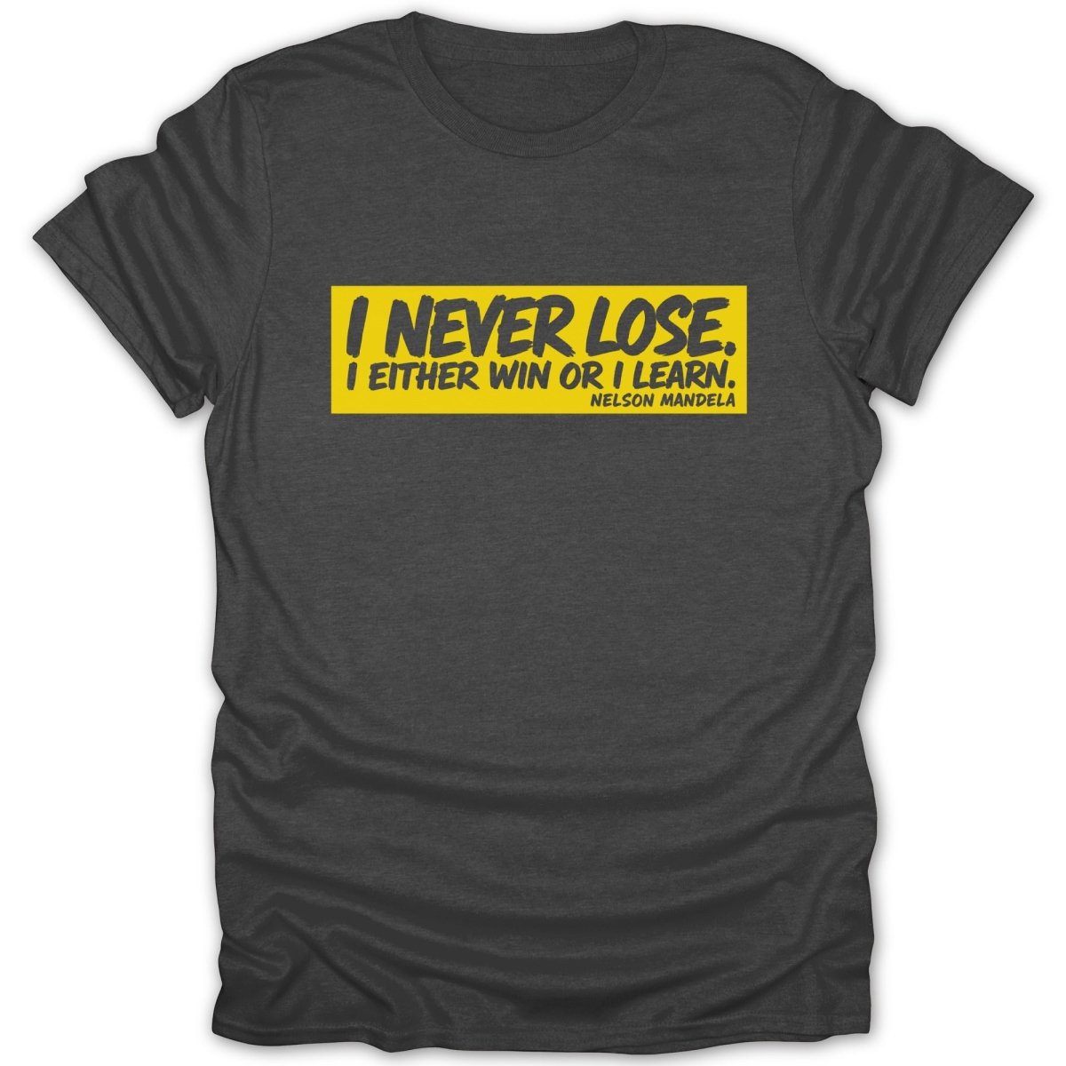 Dark grey t-shirt with yellow rectangle displaying "I NEVER LOSE. I EITHER WIN OR I LEARN. NELSON MANDELA."