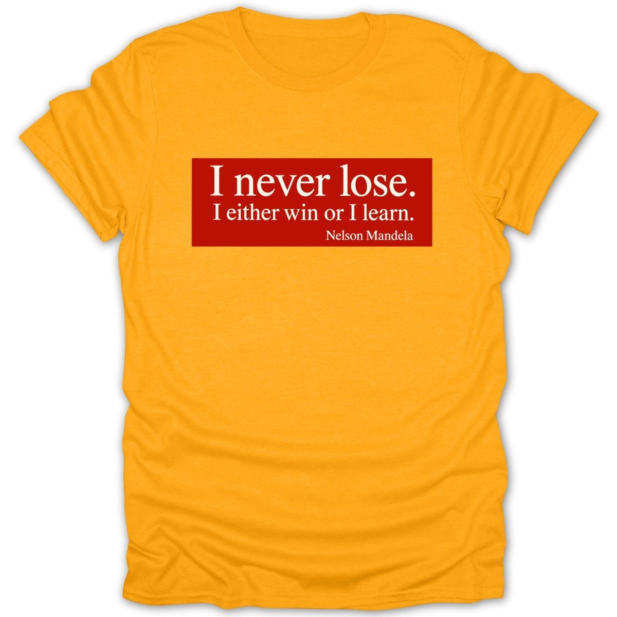Gold t-shirt with white text in a red box: "I never lose. I either win or I learn. Nelson Mandela"