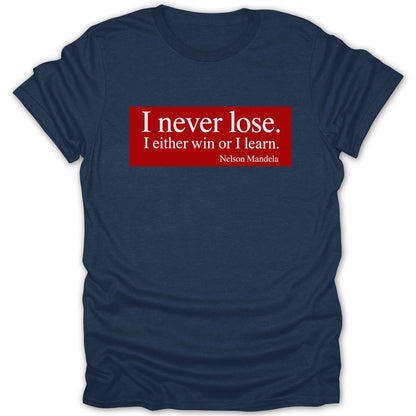 Navy t-shirt with red rectangle containing "I never lose. I either win or I learn. Nelson Mandela"